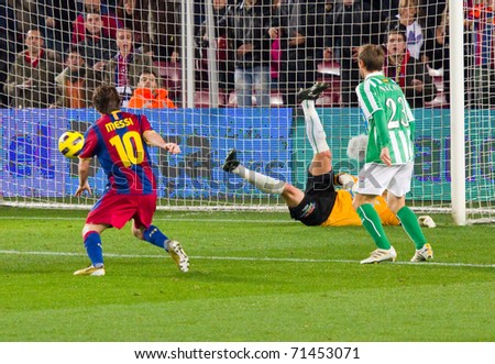 BARCELONA - JANUARY 12: Nou Camp football stadium, soccer Spanish Cup: FC Barcelona - Real Betis, 5 - 0. In the picture, Leo Messi shooting a goal. January 12, 2011 in Barcelona (Spain).