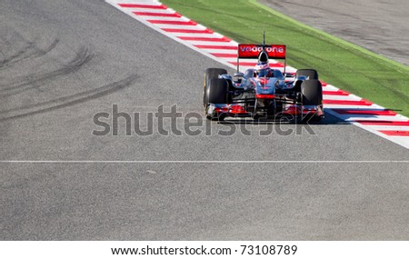 BARCELONA - FEBRUARY 18: Jenson Button (McLaren) tests his new F1 car during Formula One Teams Test Days at Catalunya circuit February 18, 2011 in Barcelona (Spain).