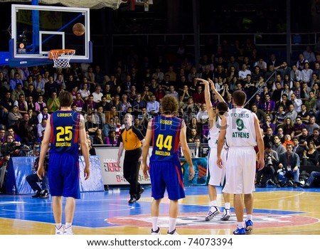 BARCELONA - MARCH 24: Dimitris Diamantidis shoots for a point during the Euroleague basketball match between Barcelona and Panathinaikos, 71-75, on March 24, 2011 in Barcelona, Spain.