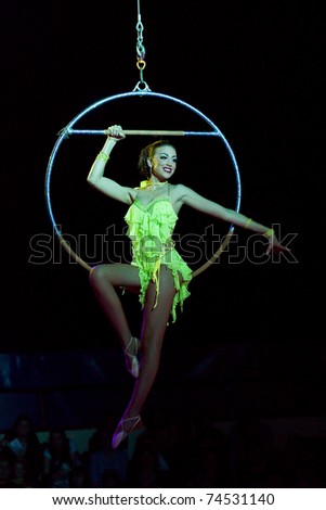 BARCELONA - APRIL 1: Acrobat woman in action during the spectacle Somnis (Dreams) of the circus Italiano on april 1, 2011, in Santa Coloma de Gramanet (Barcelona, Spain).