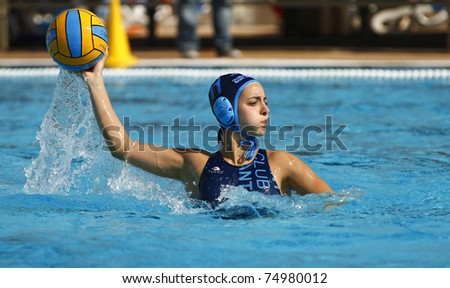 BARCELONA - APRIL 10: Water polo player in action during the women Spanish league match between CN Mataro and Sant Andreu, final score 4 - 7. April 10, 2011 in Mataro (Spain).