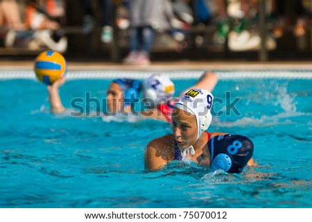 BARCELONA - APRIL 10: Water polo players in action during the women Spanish league match between CN Mataro and Sant Andreu, final score 4 - 7 on April 10, 2011 in Mataro, Barcelona, Spain.