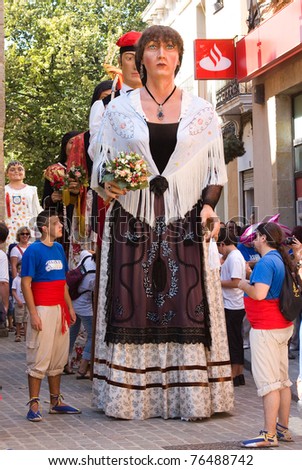 BARCELONA - SEPTEMBER 12: La Verema Wine Festival, a traditional party of Alella, with a traditional parade of Giants and Big heads, on September 12, 2010 in Alella (Spain).