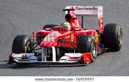BARCELONA - FEBRUARY 18: Fernando Alonso (Ferrari) tests his F1 car during Formula One Teams Test Days at Catalunya circuit on February 18, 2011 in Barcelona, Spain.