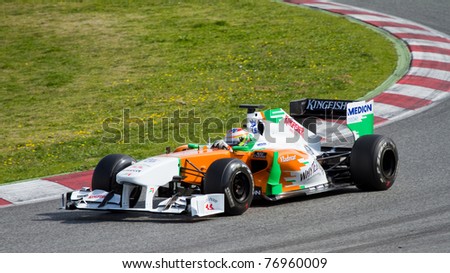 BARCELONA - FEBRUARY 18: Paul Di Resta (Force India) tests his F1 car during Formula One Teams Test Days at Catalunya circuit on February 18, 2011 in Barcelona, Spain.