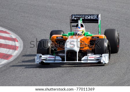 BARCELONA - FEBRUARY 18: Paul Di Resta (Force India) tests his F1 car during Formula One Teams Test Days at Catalunya circuit February 18, 2011 in Barcelona (Spain).