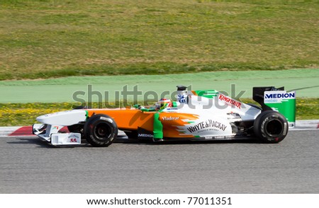 BARCELONA - FEBRUARY 18: Paul Di Resta (Force India) tests his F1 car during Formula One Teams Test Days at Catalunya circuit February 18, 2011 in Barcelona (Spain).