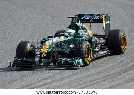 BARCELONA - FEBRUARY 18: Heikki Kovalainen (Lotus) tests his F1 car during Formula One Teams Test Days at Catalunya circuit February 18, 2011 in Barcelona (Spain).