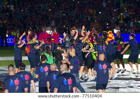 BARCELONA - MAY 13: FC Barcelona team players celebrate the Spanish League Championship victory in Camp Nou stadium, on May 13, 2011 in Barcelona, Spain.