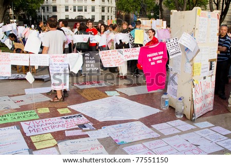 BARCELONA - MAY  19: Unidentified people protesting against unemployment and political corruption during the Spanish Revolution days, on May 19, 2011 in Catalunya square, Barcelona, Spain.