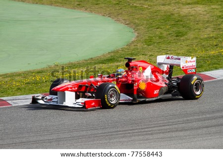 BARCELONA - FEBRUARY 18: Fernando Alonso (Ferrari) tests his F1 car during Formula 1 Teams Test Days at Catalunya circuit on February 18, 2011 in Barcelona, Spain.