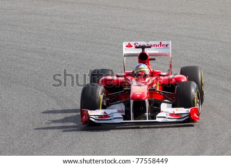 BARCELONA - FEBRUARY 18: Fernando Alonso (Ferrari) tests his F1 car during Formula 1 Teams Test Days at Catalunya circuit  on February 18, 2011 in Barcelona, Spain.