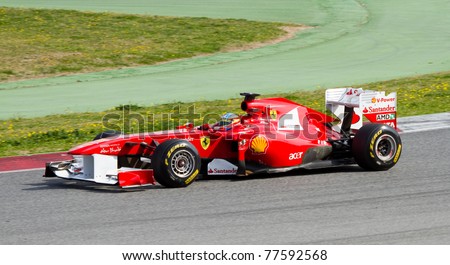 BARCELONA - FEBRUARY 18: Fernando Alonso (Ferrari) driving his F1 car during Formula One Teams Test Days at Catalunya circuit, on February 18, 2011 in Barcelona, Spain.