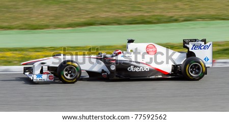 BARCELONA - FEBRUARY 18: Kamui Kobayashi (Sauber) driving his F1 car during Formula One Teams Test Days at Catalunya circuit, on February 18, 2011 in Barcelona, Spain.