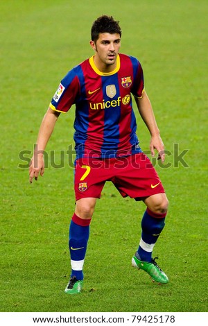 BARCELONA - DECEMBER 13: David Villa in action during the Spanish Soccer League match between FC Barcelona and Real Sociedad, 5 - 0, in Camp Nou stadium. December 13, 2010 in Barcelona (Spain).
