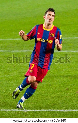 BARCELONA - JANUARY 16: David Villa in action during the Spanish League match between FC Barcelona and Malaga, 4 - 1, at Camp Nou stadium. January 16, 2011 in Barcelona, Spain.