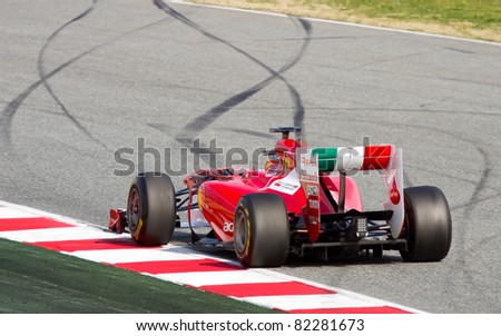 BARCELONA - FEBRUARY 18: Fernando Alonso (Ferrari) tests his F1 car during Formula 1 Teams Test Days at Catalunya circuit on February 18, 2011 in Barcelona, Spain.