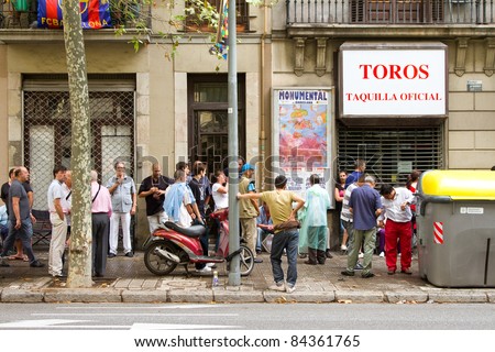BARCELONA, SPAIN - SEPTEMBER 5: Unidentified people do a queue to buy tickets for the last bullfighting of Jose Tomas in Catalonia before the prohibition, on September 5, 2011, in Barcelona, Spain.