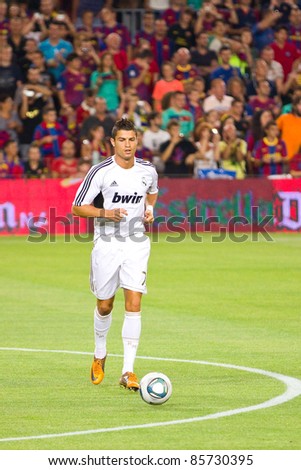 BARCELONA - AUGUST 17: Cristiano Ronaldo in action during the Spanish Super Cup final match between FC Barcelona and Real Madrid, 3 - 2, on August 17, 2011 in Camp Nou stadium, Barcelona, Spain.