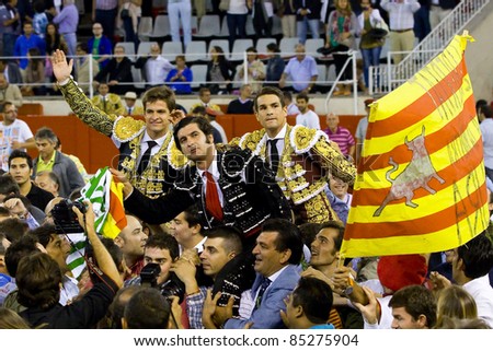 BARCELONA - SEPTEMBER 24: El Juli, Morante de la Puebla and Jose Maria Manzanares (L-R) celebrates their success at the last bullfight in Catalonia on September 24, 2011 in Barcelona, Spain.