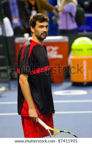 BARCELONA - OCTOBER 22: Sergi Bruguera in action during a tennis match organized as a tribute to Andreu Gimeno, on October 22, 2011, in Palau Blaugrana stadium, Barcelona, Spain.