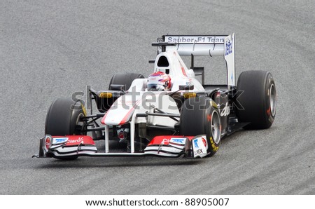 BARCELONA - FEBRUARY 18: Kamui Kobayashi of Sauber team drives his F1 car during Formula One Teams Test Days at Catalunya circuit, on February 18, 2011 in Barcelona, Spain.
