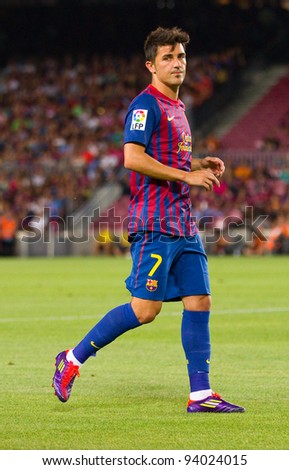 BARCELONA - AUGUST 22: David Villa in action during the Gamper Trophy final match between FC Barcelona and Napoli, final score 5 - 0, on August 22, 2011 in Camp Nou stadium, Barcelona, Spain.