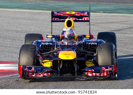 BARCELONA - FEBRUARY 21: Sebastian Vettel of Red Bull F1 team races during Formula One Teams Test Days at Catalunya circuit on February 21, 2012 in Barcelona, Spain.