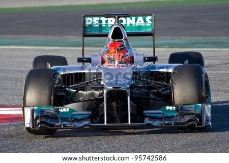 BARCELONA - FEBRUARY 21: Michael Schumacher of Mercedes F1 team races during Formula One Teams Test Days at Catalunya circuit on February 21, 2012 in Barcelona, Spain.