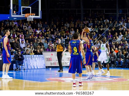 BARCELONA - MARCH 24: Juan Carlos Navarro shoots a point during the Euroleague basketball match between FC Barcelona and Panathinaikos, final score 71-75, on March 24, 2011 in Barcelona, Spain.