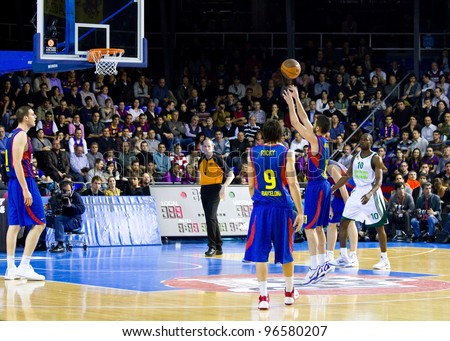 BARCELONA - MARCH 24: Juan Carlos Navarro shoots a point during the Euroleague basketball match between FC Barcelona and Panathinaikos, final score 71-75, on March 24, 2011 in Barcelona, Spain.