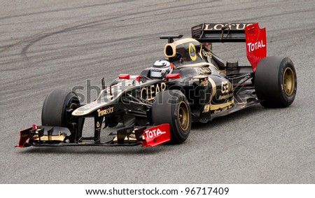 BARCELONA - MARCH 4: Kimi Raikkonen of Lotus Renault F1 team races during Formula One Teams Test Days at Catalunya circuit on March 4, 2012 in Barcelona, Spain.