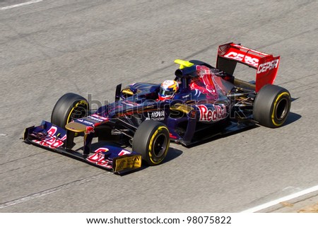 BARCELONA - FEBRUARY 21: Jean Eric Vergne of Toro Rosso F1 team racing at Formula One Teams Test Days at Catalunya circuit on February 21, 2012 in Barcelona, Spain.