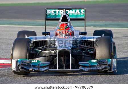 BARCELONA - FEBRUARY 21: Michael Schumacher of Mercedes F1 team racing at Formula One Teams Test Days at Catalunya circuit on February 21, 2012 in Barcelona, Spain.