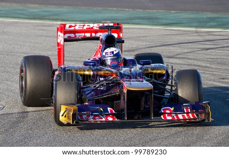 BARCELONA - FEBRUARY 21: Daniel Ricciardo of Toro Rosso F1 team racing at Formula One Teams Test Days at Catalunya circuit on February 21, 2012 in Barcelona, Spain.