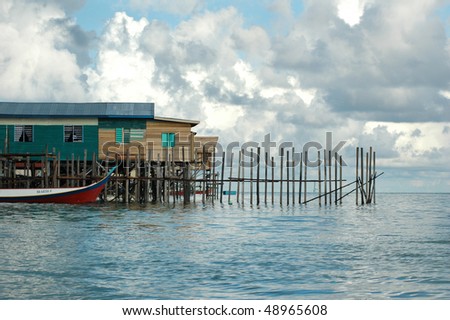 Sea houses on stilts. Mabul. Malaysia.