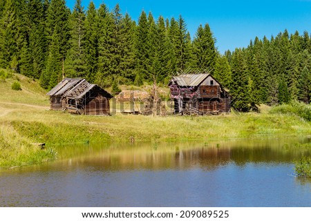 Old traditional Udmurt wooden houses on the lake