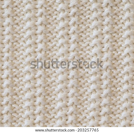 Unusual Abstract white knitted pattern background texture