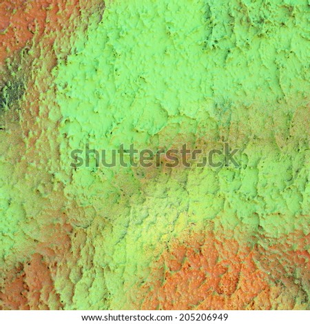 Unusual abstract colorful fresh green and orange painted wall background texture