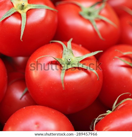 Fresh organic tomatoes background texture
