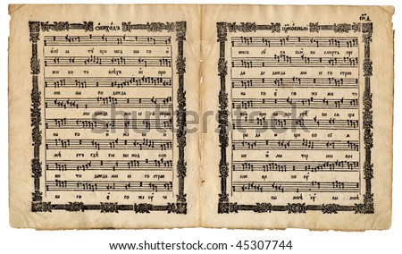Churchly ritual page spread with musical notes symbols from the very old slavonic church manuscript book Cercovnyj Obihod isolated on white background