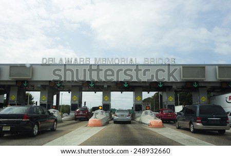 Pennsville, New Jersey, August 31;  The tollbooths in Pennsville, New Jersey before entering on to the Delaware Memorial Bridge.  This span connects New Jersey to Delaware on August 31, 2014.