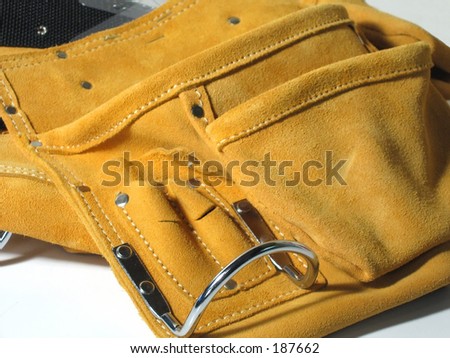 Suede tool belt worn around the waist