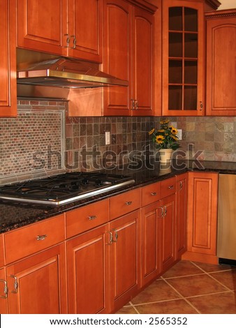 Beautiful Kitchen Cabinets  Granite Countertop And Stove Stock