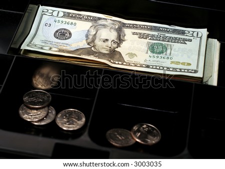 Cash register drawer with american currency and coins (serial number altered)