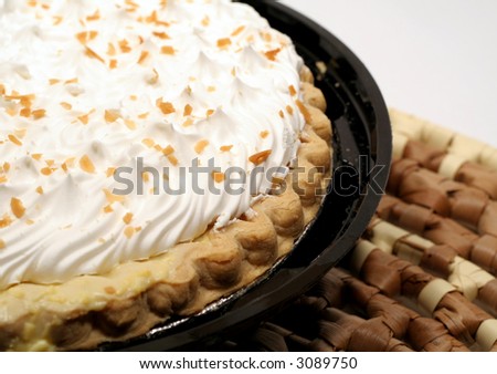 Coconut cream pie on straw mat