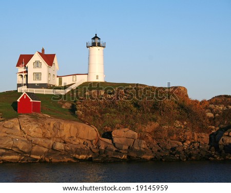 Cape Neddick, Nubble Lighthouse in York, Maine as the sun is setting.