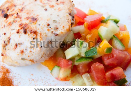 Closeup chicken stake with vegetables