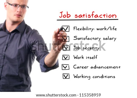 man writing job satisfaction list on whiteboard