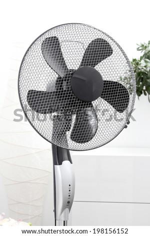 air fan standing in the room